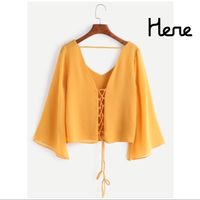 On Sale- Yellow Criss Cross Lace Up V Back Blouse Material : Polyester Color : Yellow Pattern Type : Plain Collar : V Neck Type : Tunic Decoration : Open Back Sleeve Length : Long Sleeve Fabric : Fabric Has No Stretch Season : Summer Shoulder(Cm) : 35cm Bust(Cm) : 86cm Length(Cm) : 50cm Sleeve Length(Cm) : 49cm Size Available : One-Size