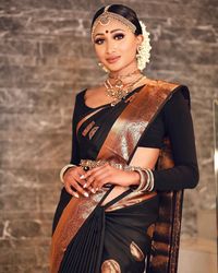 Maha Maharajah - Pro MUA, Bridal Hair & Stylist on Instagram: "B L A C K 🖤 C O P P E R Always wanted to create a bridal look on myself with kemp jewellery and a black and copper saree! My favorite…"