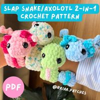 2-in-1 pattern Crochet your own Slap snake and axolotl with my confident beginner friendly pattern! PATTERN ONLY- THIS IS NOT A PHYSICAL PRODUCT This listing is for a PDF downloadable version of my low sew slap snake and no sew slap axolotl. NOTE: You can access this pattern through laptop/computer/online browser. You can find it under profile > purchases. Pattern is written in English US terms Skill level: Confident beginner Please do not copy or redistribute any part of this pattern as your ow