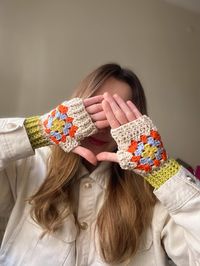 Stay warm in style with these handmade crochet granny square fingerless gloves! These cozy and colorful gloves are designed in a beautiful boho style, perfect for adding a touch of vintage charm to your winter outfits. Ideal as a thoughtful gift for her or as a treat for yourself. *🌸 Handcrafted crochet design featuring classic granny square pattern *🎨 Bright and vibrant colors bring a unique boho vibe to any outfit *✋ Fingerless design offers warmth without sacrificing dexterity *🌿 Soft, comfortable yarn for all-day wear in cooler weather *🎁 Perfect gift idea for birthdays, holidays, or any special occasion Thank you for visiting Güneş Crafts! In my small business you can find completely handmade dresses, bags, hats, skirts, sweaters, vests and decor items. I love the uniqueness of th