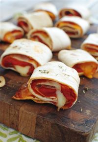 Easy pizza rolls. Will make low carb by using low carb wraps.