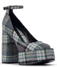 From D'Amelio Footwear, the Rayva Plaid Ankle Strap Platform Block Heel Pumps feature:Plaid fabric upperBuckled ankle strap closureSynthetic liningSynthetic outsoleApprox. 1.77" platform heightApprox. 4.72" heel heightImported.