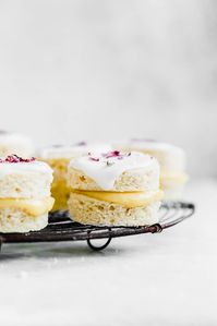 Coconut Lemon Curd Petit Fours: homemade lemon curd sandwiched between two coconut flour cakes and topped with lemon icing. HELLO SPRING!