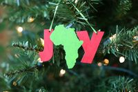 check out this guy's etsy shop -- selling ornaments to raise money for their ethiopian adoption!! // Joy in Africa Ornament  5 wide by ethiopiadad on Etsy, $10.00