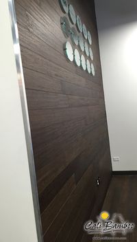 Rustic Barnwood Fossilized® bamboo flooring as a modern wall treatment