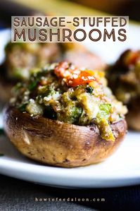 These Sausage-Stuffed Mushrooms are exploding with incredible taste.  The recipe is easily adaptable to your owns tastes and to whatever ingredients you have on hand.  Addictively delicious and so easy to prepare! Get the recipe with ALL-NEW VIDEO on the blog!