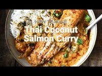 30 minute salmon recipe with video. One-pan Thai coconut seared salmon simmered in a rich, spicy, creamy coconut sauce. Easy and delicious.