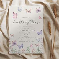 He gives me butterflies! This elegant bridals shower invitation features a butterfly theme with watercolor garden floral accents. The pretty watercolor butterflies are in beautiful shades of pink, purple, coral pink and baby blue.