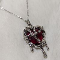 Gothic Heart Shaped Dripping Chain Red Crystal Silver Pendant On A Stainless Steel Chain Necklace Comes On A 16 Inch Stainless Steel Necklace With A Lobster Clasp And 1.5 Inch Extension Chain