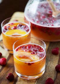 Raspberry Peach Prosecco Punch - Frozen Raspberries, Peach Nectar, Prosecco.