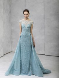 Powder-blue dress with hand-embroidered silk thread and crystals and an over-skirt.