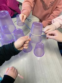 Looking for elementary teamwork activities! Here’s one! This cup stacking challenge is great for STEM. We used only four materials for this challenge. (Scissors, plastic cups, rubber bands, strings). Its environmentally friendly as we reuse our materials!  Students are not allowed to touch the cups with their hands. They are to work together as a team and use rubber band and string to move the cups around! It was super duper fun! #stem#school#kids#teamwork#team#challenge #science#math#engineering#blueprint#students#fun#cool#ideas#learn#elementary#technology#education#learning#learn#plan#together#environment #environmentalscience #easy#easytoddleractivities #doityourself #stemeducation #teachers#teachersofinstagram