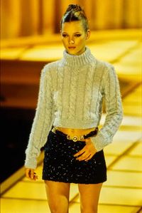 Black patent leather Gianni Versace belt from the Fall/Winter 1994 collection, part of look 66, modeled by Kate Moss.  #gianniversace #versace #runwayfashion #fashionarchive #thereallist