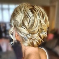 Modern Curly Upstyle for Short Hair