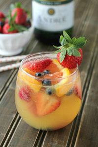 Light and refreshing white wine sangria made with champagne, and fresh fruit! No added sugar!