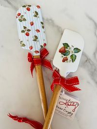 Add a pop of sweetness to your baking with our Strawberry Spatula! This cute spatula features a fun strawberry print, perfect for adding a touch of whimsy to your kitchen adventures. Its durable design makes it a must-have tool for all your baking needs.