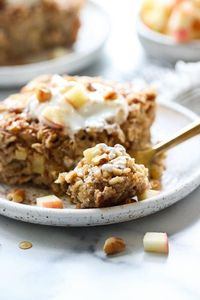 Filled with chewy oats, tender apple chunks, warm cinnamon, and toasted walnuts this Apple Cinnamon Baked Oatmeal is a delicious breakfast for kids and adults alike.