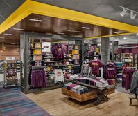 See how you can combine traditional and custom fixtures when designing university bookstores!