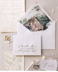 Watercolor venue envelope liner and handmade paper invitation suite!