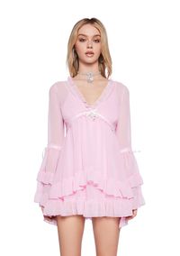 Be heavenly in this chiffon mini dress which has tiered bell sleeves, interlocking ribbon detailing, a ruffled trim, a plunging neckline, a cross charm on the front, and a tiered skirt.