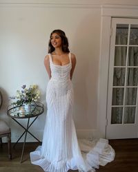 We love this intricate beaded gown that hugs every curve perfectly. ⁠ ⁠ "Jolene" Dana Harel ⁠— book an appointment and try her on. ⁠ ⁠ Schedule at one of our #DressTheory locations.⁠ #Nashville #Seattle #SanDiego.⁠ ⁠ Click the link in bio.⁠ ⁠ #dresstheory #realdresstheorybrides #weddingdressstyling #bridalstyleinspiration #modernbride⁠ #bridalgown