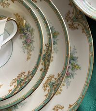 Please read the description below before purchasing.  Contact me if any questions.   Free ship!  Vintage Noritake china with beautiful bouquets and teal/gold edge.    These very pretty dishes are almost antique, made by Noritake with 1930s backstamp.    The name of the pattern is not on the backstamp.  The pattern features  with gold rim/accents, blue/green (mint/teal) pattern along the rim and on inner rings, and with floral bouquets on cream/white background.    Overall good antique/vintage co