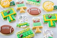 Green Bay Packer inspired birthday cookies made with royal icing.