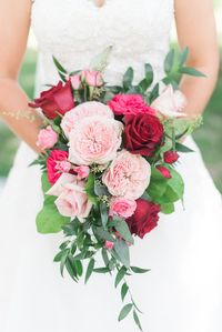 Des Moines wedding florist // eucalyptus and pink roses, red flowers, light pink bouquet #weddingflowers #summerwedding #pinkflowers #weddingboquet #desmoinesflorist