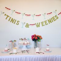 Because sometimes you need a weenie with your tini. Our party kits give you everything you need to throw a kickin' party. Choose from three options (select from the drop down menu): Party Kit #1: 1 Garland + 10 food flags/cupcake toppers + 10 drink stirrers + 100 pieces confetti Party Kit #2: 1 Garland + 10 food flags/cupcake toppers + 100 pieces confetti Party Kit #3: 1 Garland + 10 drink stirrers + 100 pieces confetti 🎉 All the Lil' Details 🎉 1 TINIS & WEENIES GARLAND *Handmade from cardstoc