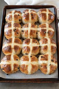 How to Make Traditional Hot Cross Buns. With spices like cinnamon, all-spice, ginger and currants. They smell as good as they taste while baking. #hotcrossbuns #easterbuns #traditionalhotcrossbuns