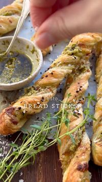 Easy bread sticks 🤍 Here is a video, so it’s easier to save for everything asking for this! save this for soups, stews, tapas or appetisers You’ll need: 1 sheet of puff pastry 3 tablespoons of green pesto 100g. shredded cheese or vegan cheese Salt and pepper 2 tablespoons of plant butter Sesame seeds Bake for 10-12 mins at 200ºC Credits: @micadeli_ Get more tasty recipes here >>https://onedollarkitchen.com/recipes/bread-recipes/