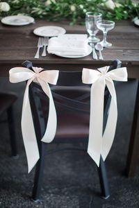 tie ribbons on chair backs