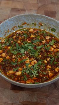 Leah Cohen 🇺🇸🇵🇭 on Instagram: "This chunky dumpling sauce is easy, simple to make and goes with so much more than just dumplings. I could eat this with any protein, a bowl of rice and I’m all set. Please see recipe below:

1 Tbs minced garlic
1/2 Tbs minced ginger
1.5 Tbs toasted sesame seeds
2Tbs sugar
5 Tbs low sodium soy sauce
4Tbs rice vinegar
3Tbs roasted unsalted chopped peanuts
1Tbs sesame oil
1/4C chili oil
1/4C sliced green scallions 
1/4C chopped cilantro"