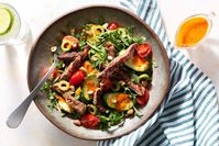 Juicy steak slices and vibrant vegetables make this paleo and gluten-free main-course salad as good for you as it is good to eat.