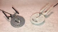 Star Trek Enterprise & Vengeance Ceiling Fan Pull Chain ~ Light Pull Chain Enterprises is 3 & 1/2” long and comes with a black (space) colored 8” chain. Vengeance is 3” long and comes with a gun metal gray colored 8” chain.