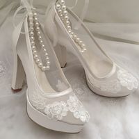 12 cm heel size 3.5 cm platform length High Heel Wedding Shoes Ivory ,white and black color options These shoes will look great on you along with your wedding dress at your wedding. Everyone's eyes will be on you.