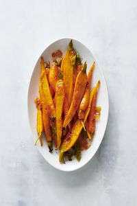 Simple roasted carrots get a holiday-worthy makeover with an easy, flavor-packed glaze, thanks to spicy-sweet pepper jelly.