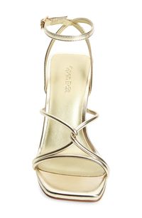 A square toe and architectural heel frame a strappy sandal secured by an adjustable buckle closure at the ankle. 3 1/2" length (size 8.5) Synthetic upper and lining/rubber sole Imported