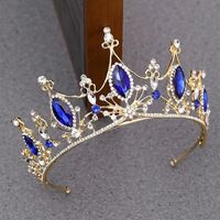 Blue sapphire Crystal Tiara Bridal Crown Detail Princess Queen headdress diadem This stunning Tiara Crown is crafted from tarnish resistant zinc alloy and intricately decorated with crystals to create an elegant look ideal for any special occasion, including weddings, quinceañeras, birthdays, pageants and more. Delight the Queen of your world and tell them they're your one and only! 🤩 Include a personal touch with our gift wrapping option that includes a hand written card! *GIFT WRAPPING AVAILA