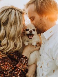 Couple with Dog | Pet Family Photos | Engagement Photos with Pets | Pomeranian Dog | Orange County Wedding Photographer #coupleshoot #doglovers #pomeranian #engagementphotos #anniversary #familyphotography #petportrait