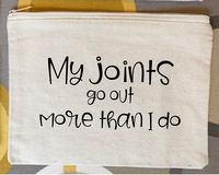 -My Joints Go Our More Than I Do.- A zippered cotton canvas pouch with funny saying in vinyl lettering. Available in black or natural in two sizes. Please select your color and size in the drop down menu. This bag makes a great gift!