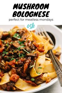 Your Meatless Monday just got really, really exceptional - hello Mushroom Bolognese! Loaded with veggies, this healthy vegan dinner recipe comes together easily and I promise that you won't mis the meat! Plant based and packed with healthy vitamins and minerals, this bolognese is great for a crowd and also super flexible. Serve over polenta for a gluten free meal, or cauliflower puree for a paleo and grain free dinner. #vegan #veganrecipes #pasta #plantbased