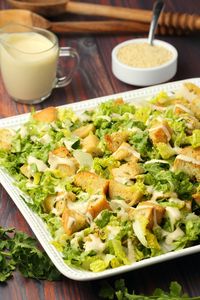 Delicious vegan caesar salad packed with crispy croutons and topped with a creamy vegan caesar dressing. Rich and satisfying.