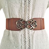 Womens Wide Vintage Style Antique Gold Spirals Buckle Brown Vegan Leather Elegant Corset Cinch Elastic Stretch Waist Dress Belt, New No Tags Stretches To Fit Your Waist Black Vegan Leather And Elastic Material Beautiful Fashion Accessory, Can Be Worn For Dressed Up Occasions: Birthday, Wedding, Cocktail Party, Gala, Or Casual Occasions Such As At Work At The Office, For Dinner Etc Versatile, Cinches Your Silhouette Length Is 36" Laying Flat Unstretched, Width 2.4". Fits Waist Sizes 38" To 45" (S