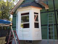 constructing bay windows | Walk-out Bay Windows gets all trimmed out with picture frame ...