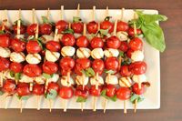 Just Made for a Party! Crowd pleaser, for sure. Caprese salad on a stick - I didn't really follow this recipe. Instead, just marinated the mozzarella, tomatoes & basil in olive oil for a couple of hours. Then, put on skewers in a consistent pattern (not all the way up the stick). Sprinkle with fresh ground pepper & sea salt. Voila! Perfect outdoor party finger food!