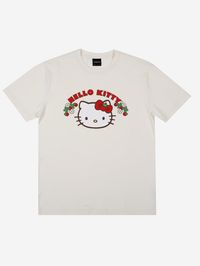 Hello Kitty was born in the suburbs of London. She lives with her parents and her twin sister Mimmy who is her best friend. Her hobbies include baking cookies and making new friends. As she always says, "you can never have too many friends!" Hello Kitty Profile Short Sleeve Puff print art on the front Ribbed Crew Neck