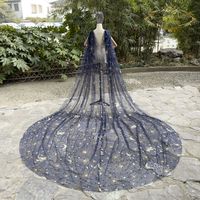 Step into a fairytale with our "Enchanted Nights" navy blue cathedral length veil, featuring dazzling silver sequin embellishments of stars, moon, and winged horses. This exquisite veil is perfect for brides who want to add a touch of magic to their wedding day look. The intricate sequin work on the veil creates a stunning sparkle effect that will make you shine like a star. The cathedral length veil adds a touch of elegance and sophistication to your wedding dress, making you feel like a true p