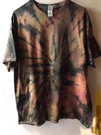 Tie Dye T-shirt. Hand tied and Hand dyed. This is a swirl pattern. Rust brown and black - See size options below!  NOT ALL SIZES ARE AVAILABLE PLEASE MESSAGE FOR AVAILABILITY BEFORE ORDERING  I started doing tie dye about twenty years ago. I started playing around with box dyes and progressed form there. I now use professional dye and it will stay in your t-shirt, minimal fading. As with any dyed fabric - DO NOT BLEACH, Wash with like colors. All of my t-shirts and dyed using a chemical process, professional dye. I do not use cheap dyes or vegetables dyes that wash out. DO NOT BLEACH, Wash with like colors. Tie dye is not an exact science and colors and dye patterns will not be the same as those pictured.  Note: I have included a picture of approximate measurements of each t-shirt size. T-