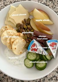 My favorite easy lunch is a snack plate. It's so satisfying and you can change it up a million different ways depending on what you're feeling for that week! #snackplate #adultlunchables #healthylunchidea #foodtok #wholefoods #easylunch #lunchideas